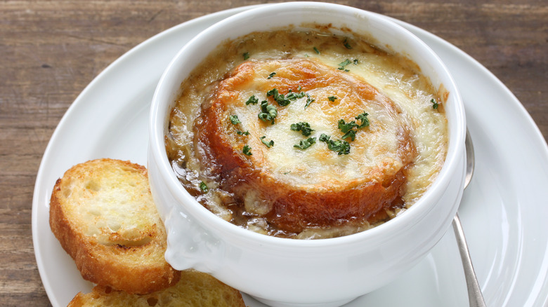 bowl of French onion soup with crostinis