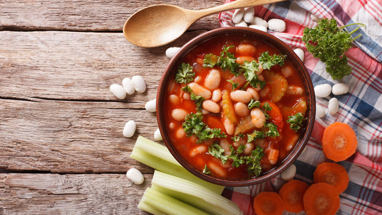 Minestrone soup on table with spoon