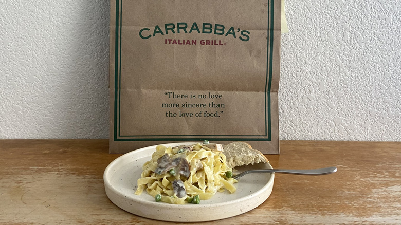 plated Carrabba's Alfredo with a piece of bread