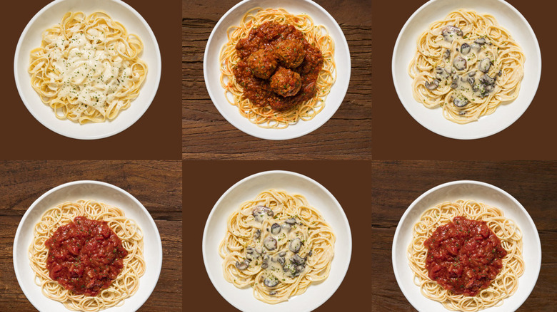 white bowls of varying pastas