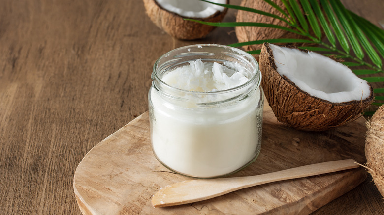 solid coconut oil with fresh coconuts