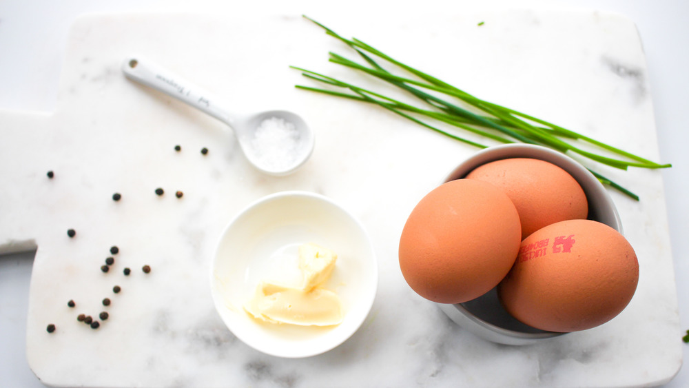 salt chives butter eggs and pepper for an omelet