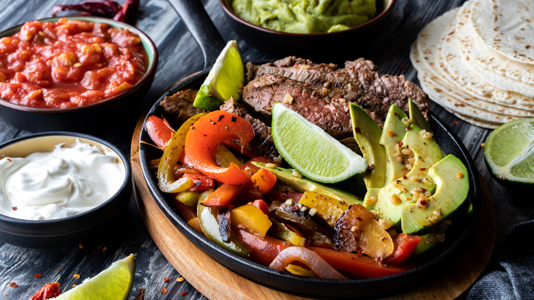 steak fajitas with avocado and peppers 