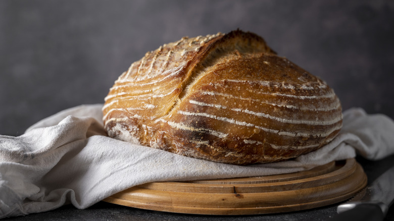 Fancy sourdough loaf on towel