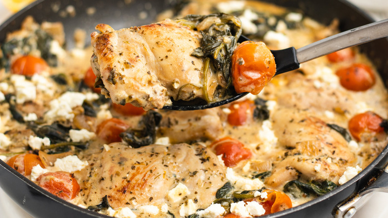 chicken and spinach in pan