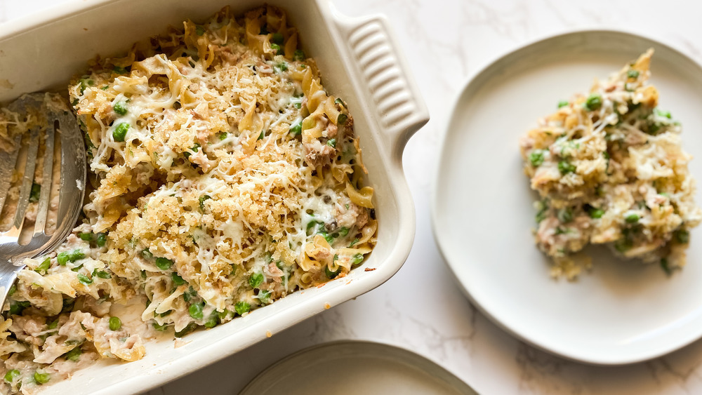 tuna casserole on a plate and in a casserole dish on a white counter