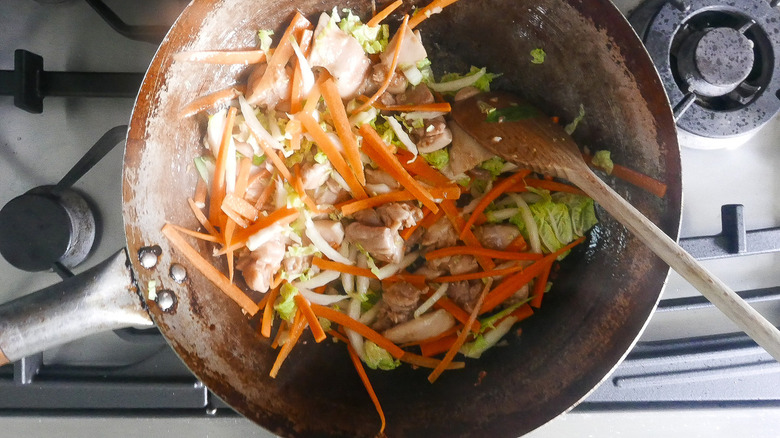 chicken and vegetables in wok