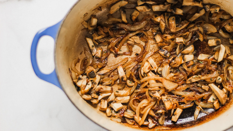 mushrooms and onions in pot