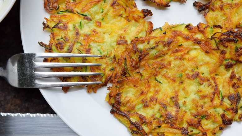 latkes on plate with fork