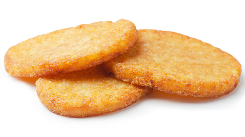 Frozen hashbrowns, cooked, white background