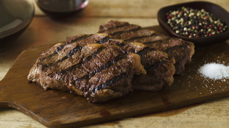 carne asada on wooden board