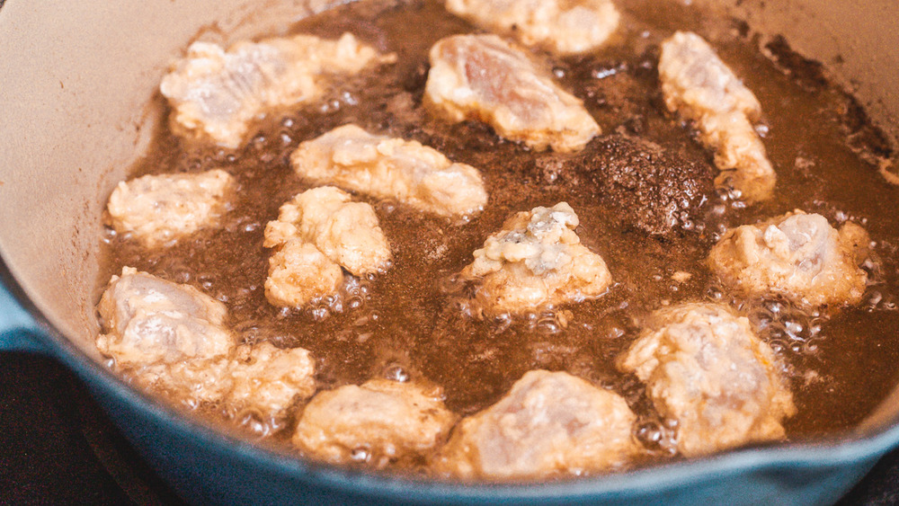 orange chicken frying