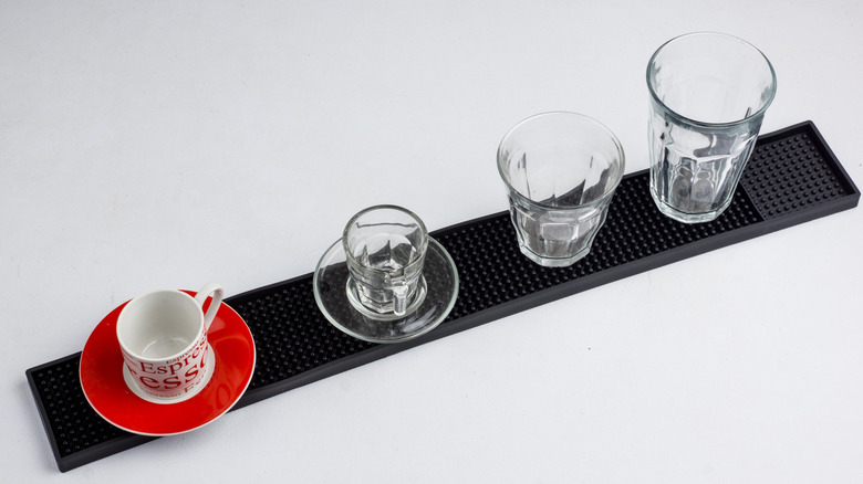 Rubber bar mat with different glasses on it