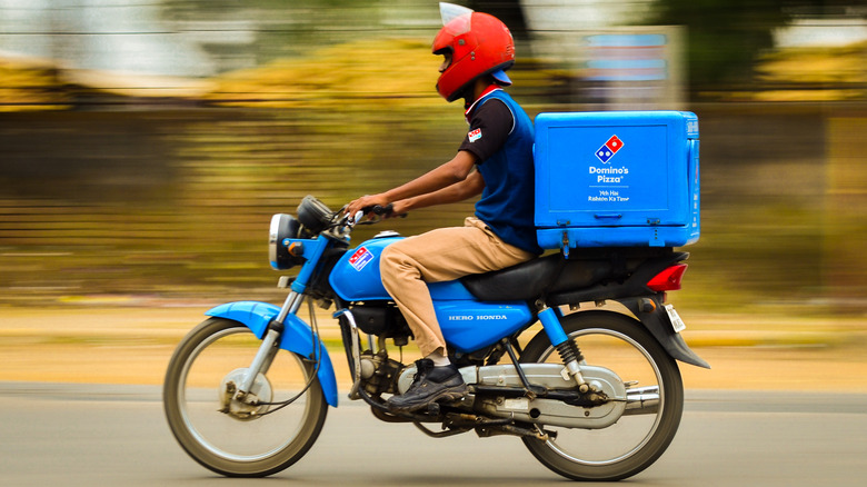 Domino's delivery driver on bike