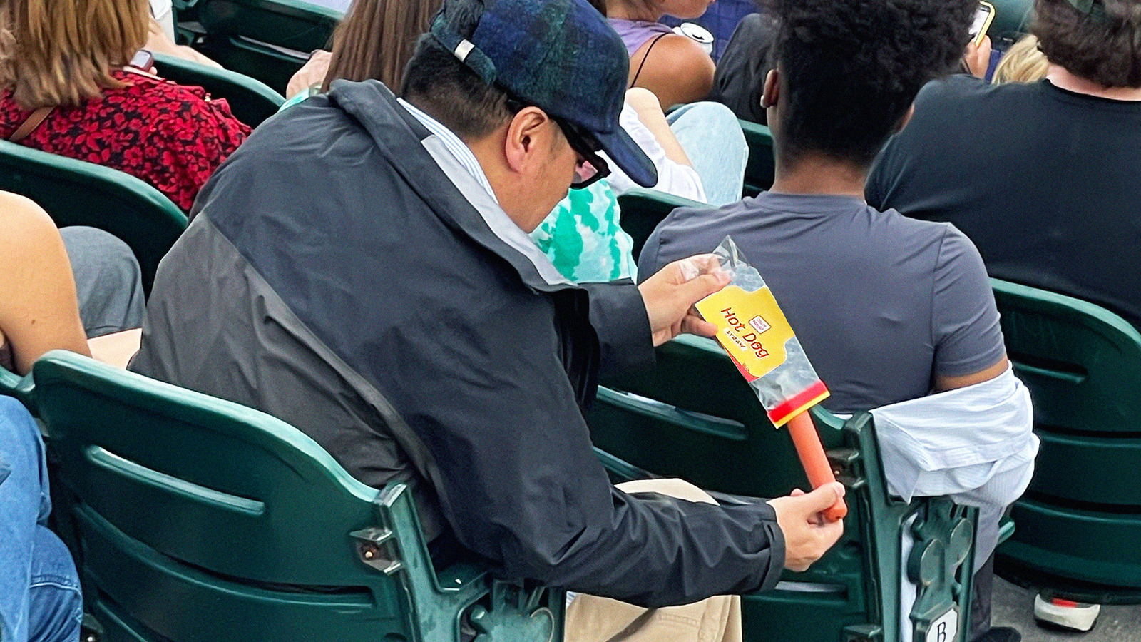 Watch vid of a Yankee fan drinking a beer w. a hot dog straw