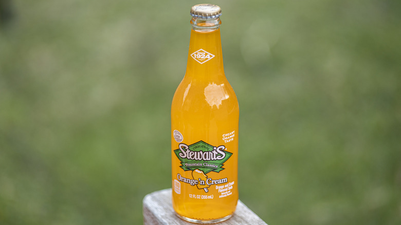 a bottle of Stewart's Orange 'n Cream soda