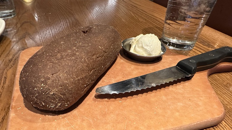 Board with pumpernickel bread