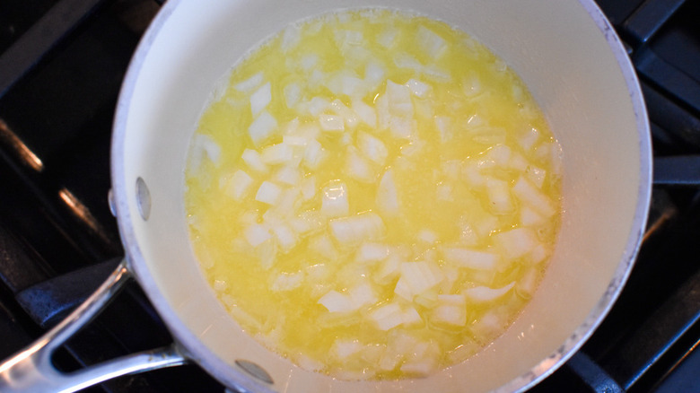 onions and butter in pan