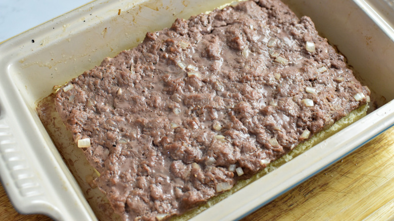 slider halves in baking dish