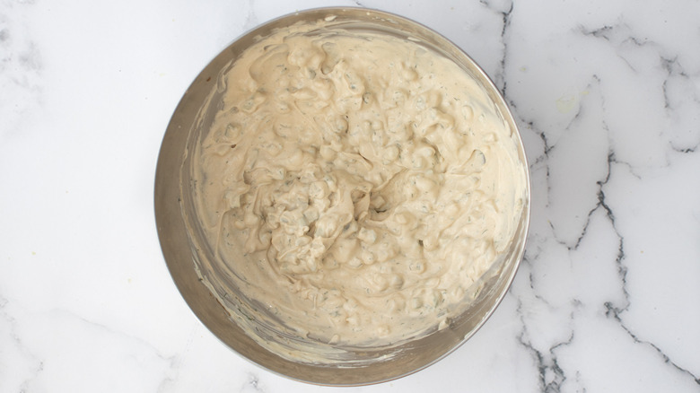 tartar sauce in metal bowl