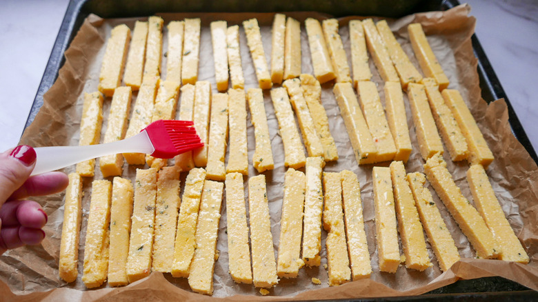 polenta fries on baking sheet 