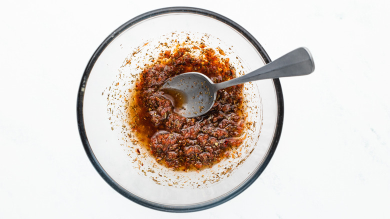 herby tomato paste mixture in bowl