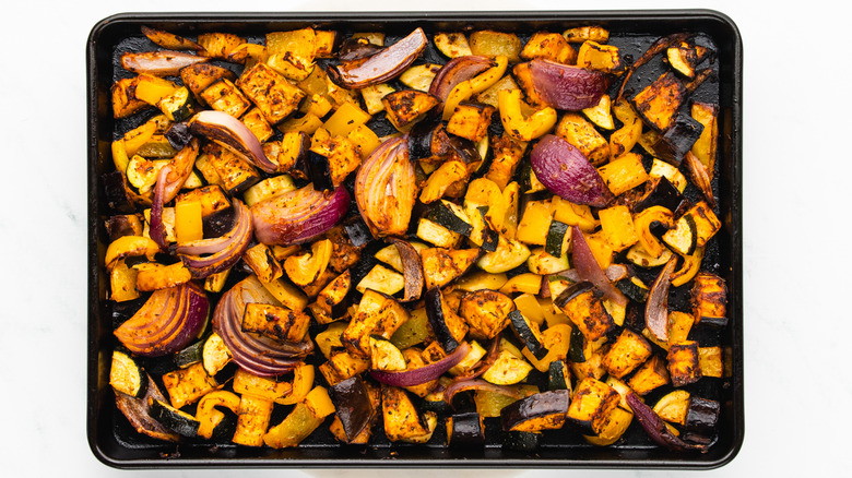 roasted vegetables on baking sheet