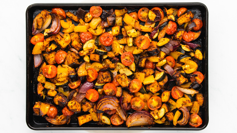 roasted vegetables on baking sheet