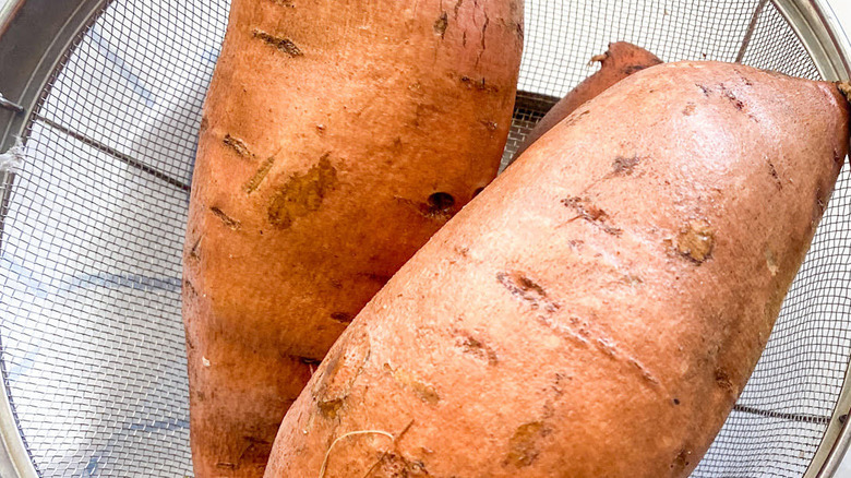 sweet potatoes in a strainer