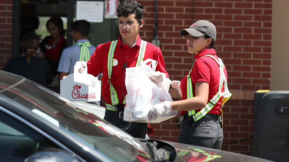 Chick-fil-A employees  serving food