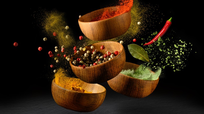 wooden bowls of spices