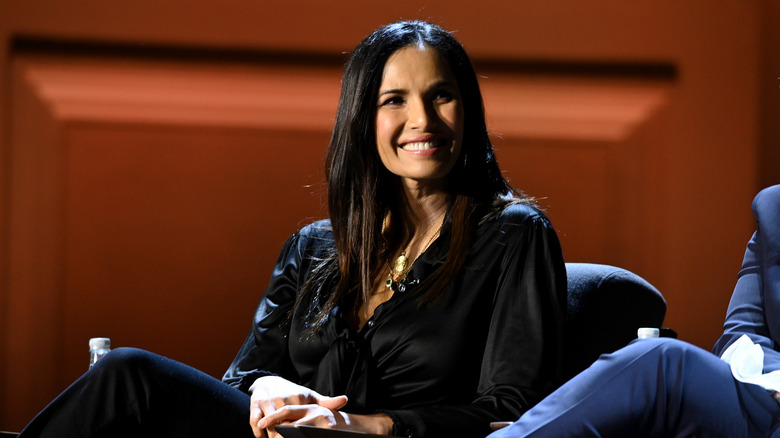 Padma Lakshmi smiling on a panel