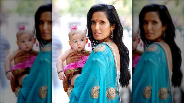 Padma Lakshmi in sari with baby Krishna