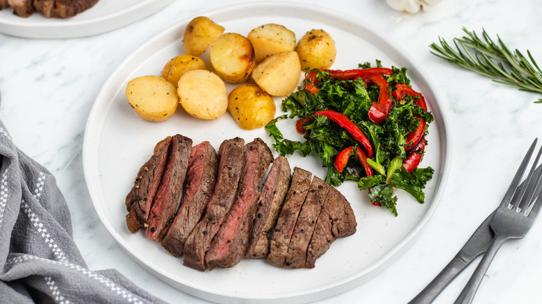 sliced steak potatoes salad