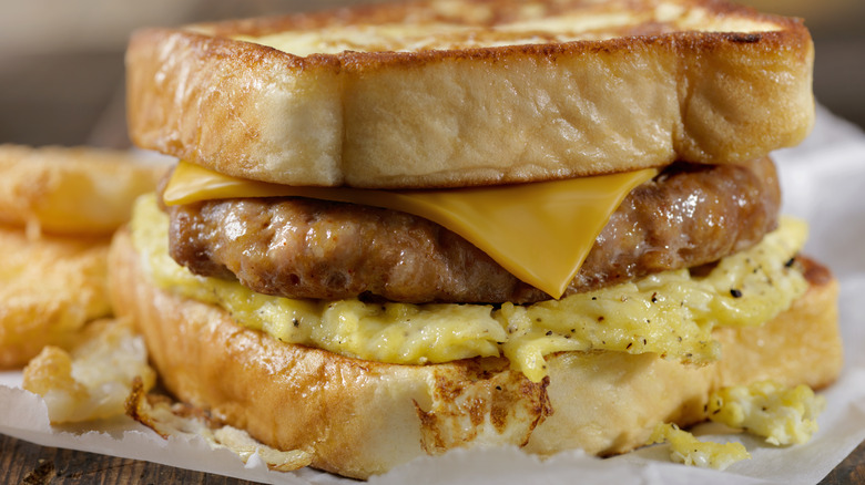 Breakfast sandwich with sausage, egg, and cheese