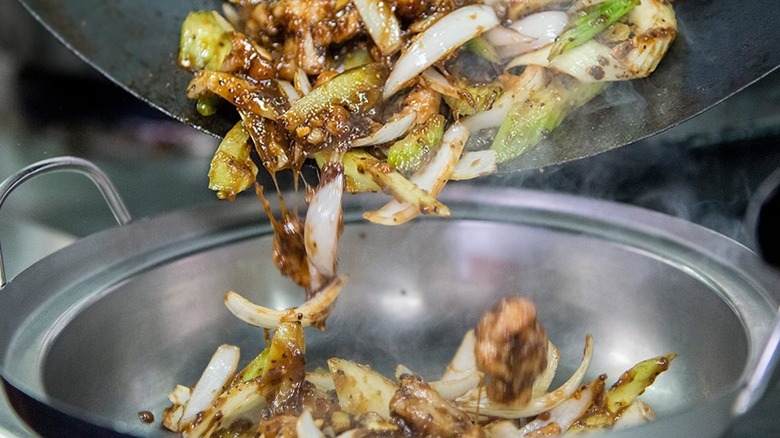 Black pepper chicken being prepared