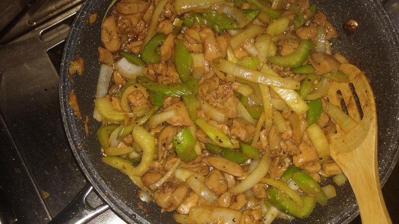 Black pepper chicken in a wok