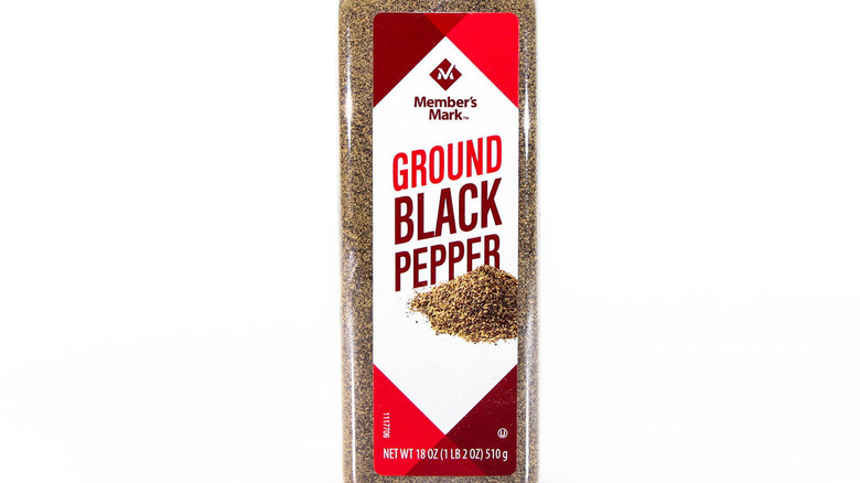 A container of ground black pepper