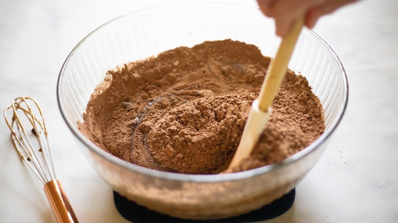 bowl of cocoa powder mixed with other ingredients