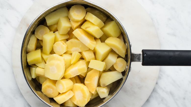 parsnips potatoes in pot