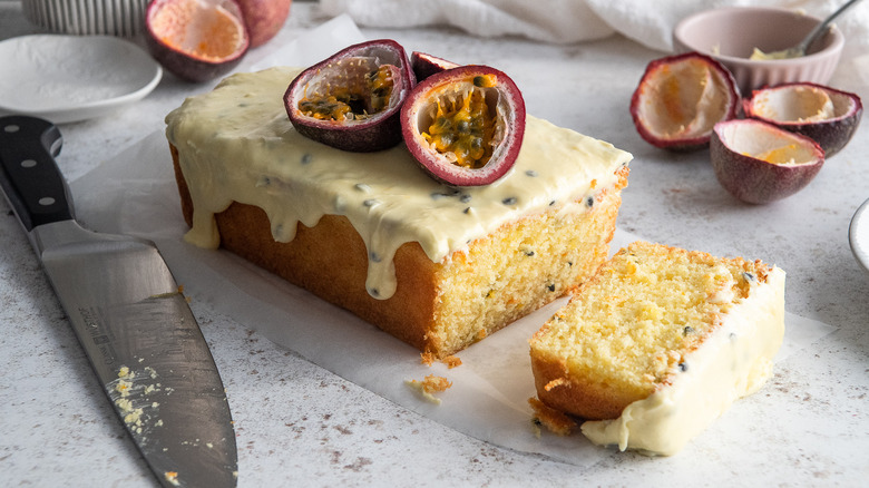 sliced passionfruit cake on counter 