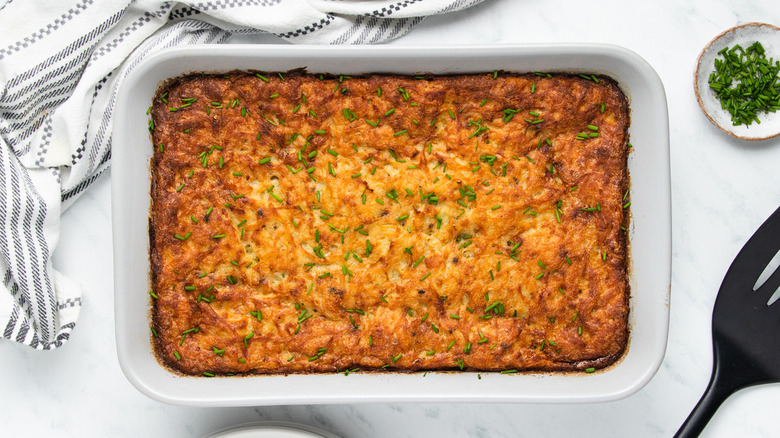 potato kugel in white pan