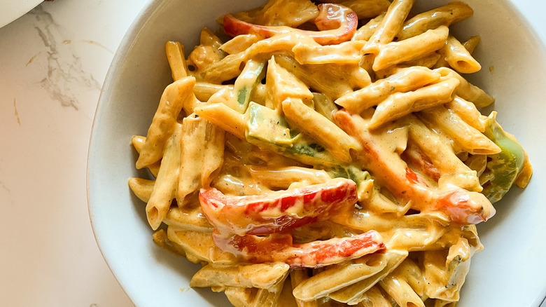 pasta, sliced peppers, and chicken cubes smothered in a Southwestern cheese sauce served in bowl