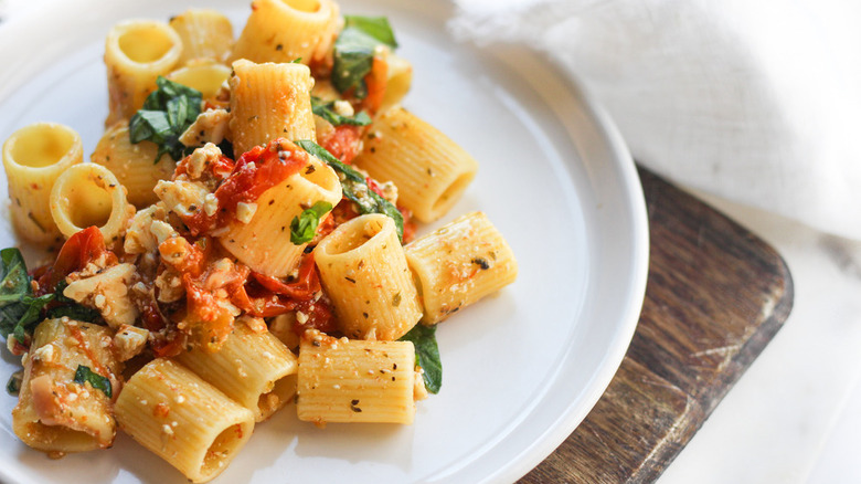 white plate piled with TikTok feta pasta