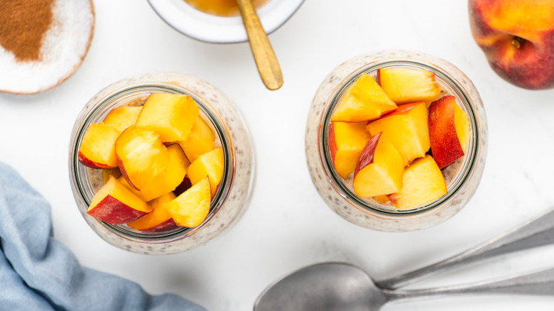 two jars of peach and cinnamon overnight oats