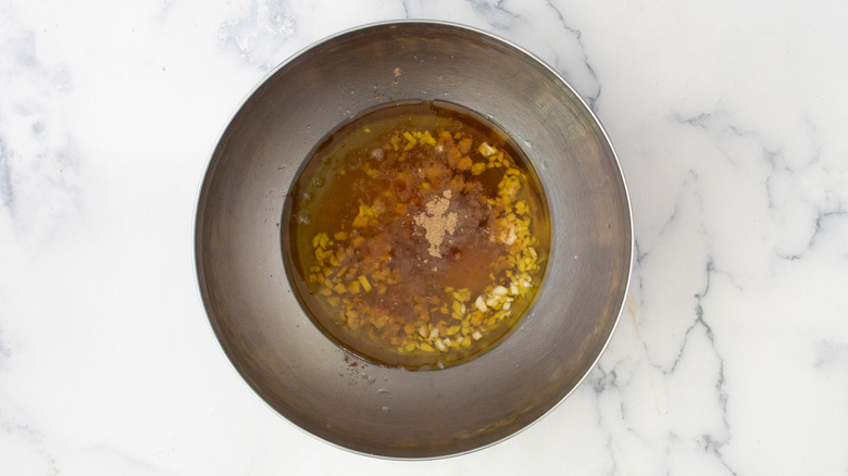 salad dressing in metal bowl