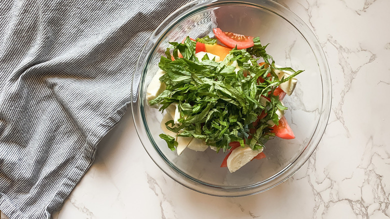 peach Caprese salad in bowl