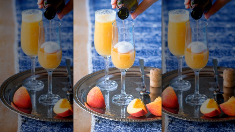 Making a peach Bellini cocktail