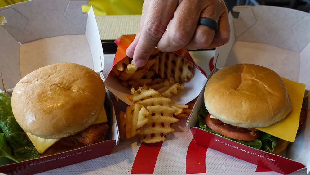 Two Chick-fil-a sandwiches and waffle fries