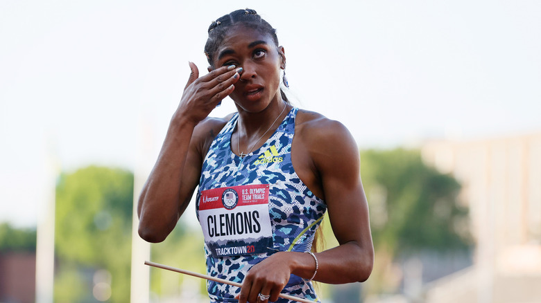 Clemons wiping away tears after race